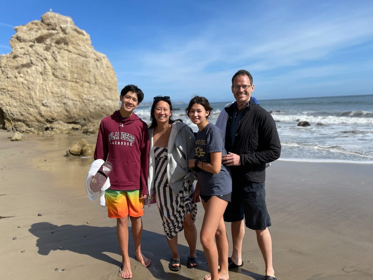 Dr. Said with his family on the beach